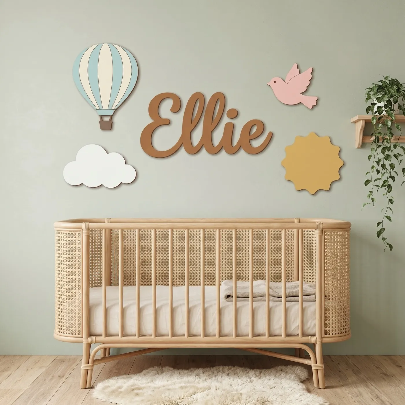 Hot Air Balloon sign with the name Ellie above a crib