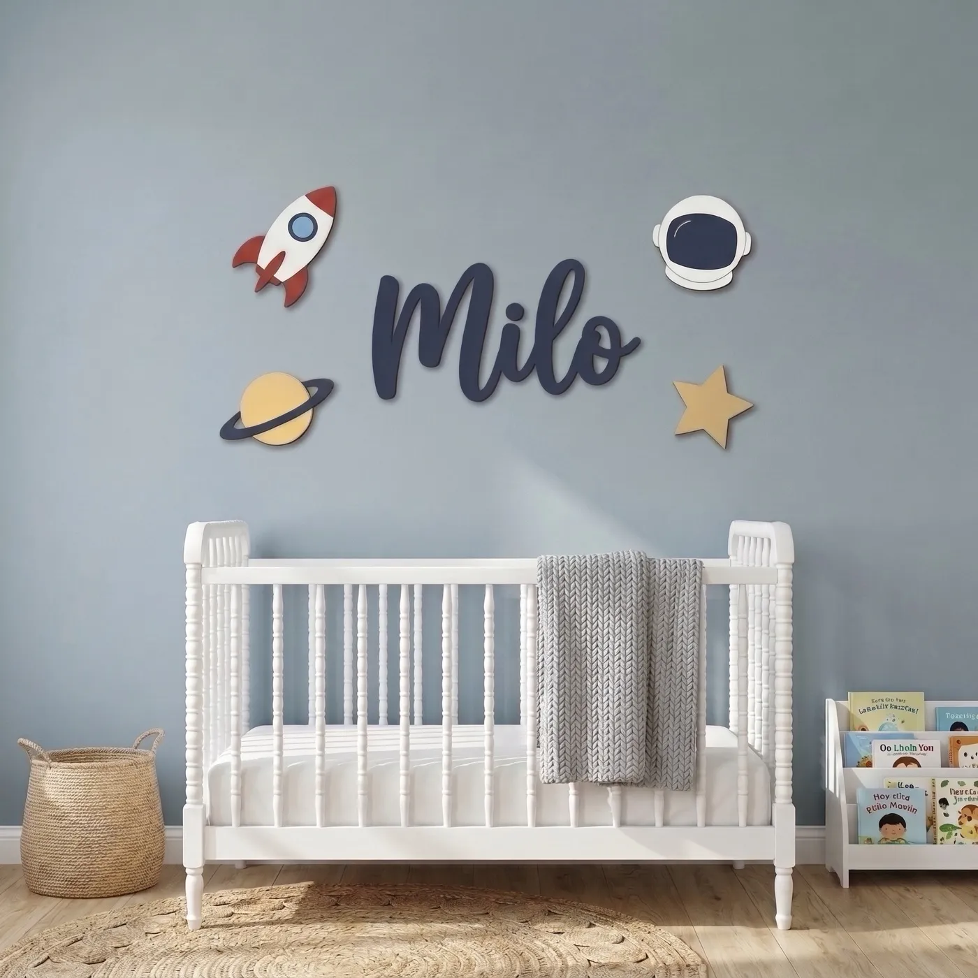 Space sign with the name Milo above a crib